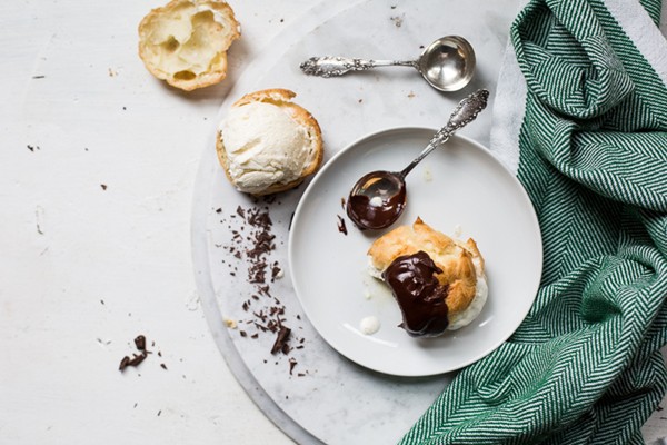 Profiteroles with coconut allspice ice cream and hot fudge