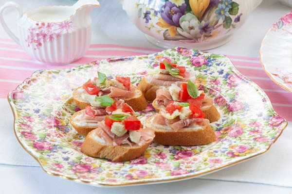 Prosciutto & artichoke herbed crostini