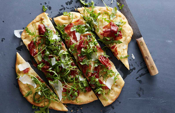 Prosciutto, arugula, and Parmesan pizza