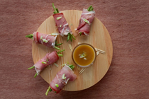 Prosciutto, goat cheese, and green bean roll-ups