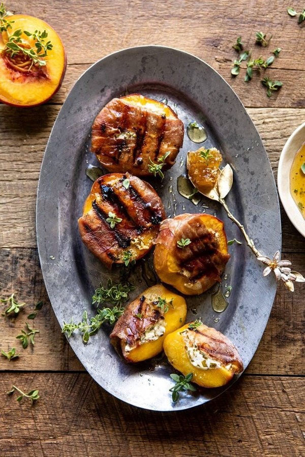 Prosciutto goat cheese stuffed peaches with thyme honey