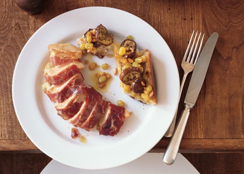 Prosciutto-wrapped chicken breasts with eggplant panzanella and raisin-pine nut vinaigrette