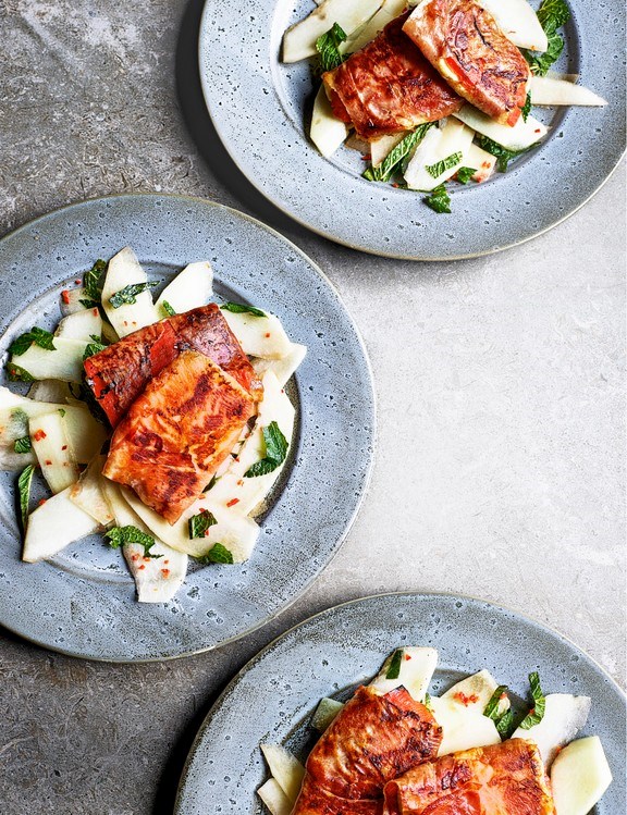Prosciutto-wrapped halloumi with melon and mint salad