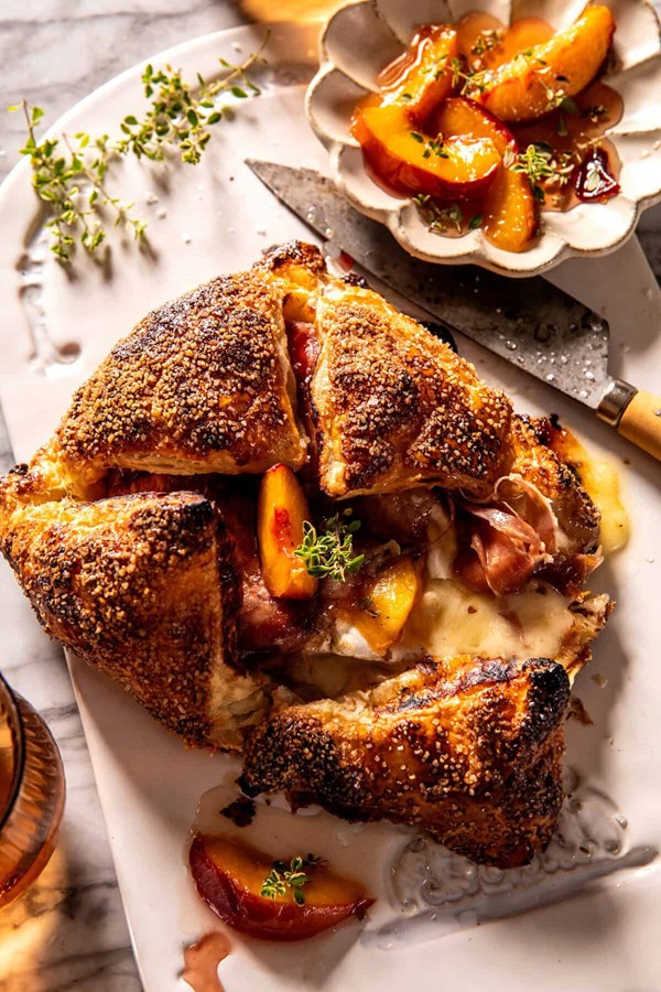 Prosciutto wrapped peach baked Brie in pastry