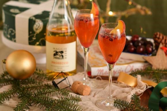 Prosecco, pomegranate & peach mocktail