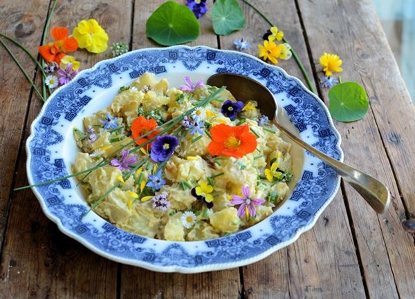 Provençal potato salad with truffle oil and edible flowers