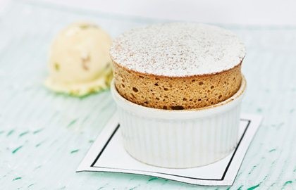 Prune and Armagnac soufflé with tutti frutti ice cream
