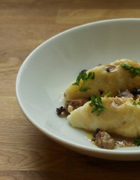 Prune-stuffed gnocchi with foie gras butter sauce