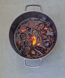 Prunes in spiced wine