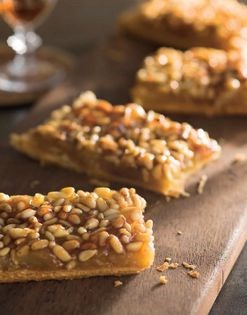 Puff pastry with apple compote coated in pine nuts (Hojaldres de piñónes con manzana)