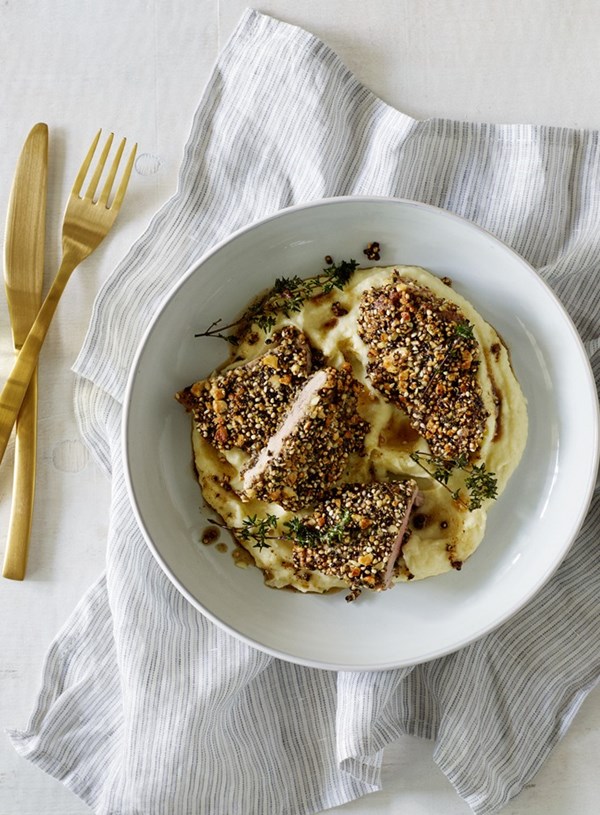 Puffed quinoa and cashew pork schnitzel with parsnip and tahini mash