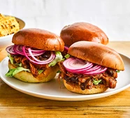 Pulled BBQ aubergine & black bean burgers