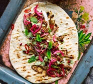 Pulled goat kebabs with coriander dressing