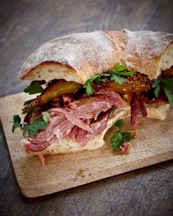 Pulled ham hock on potato sourdough with roasted mustardy shallots