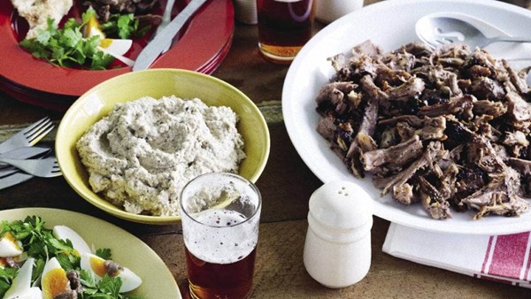 Pulled lamb with babaghanoush and parsley, egg and anchovy salad