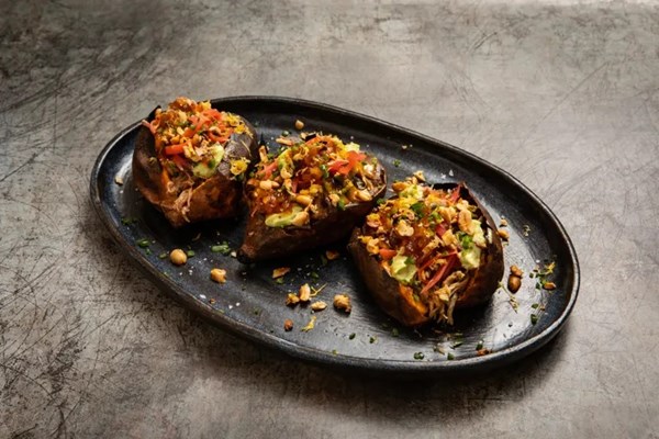 Pulled pork loaded sweet potatoes, apple and chilli chutney, lime zest aioli and pickled shredded carrots