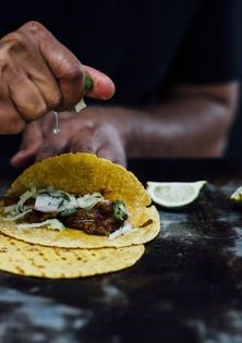 Pulled pork tacos with apple and serrano slaw