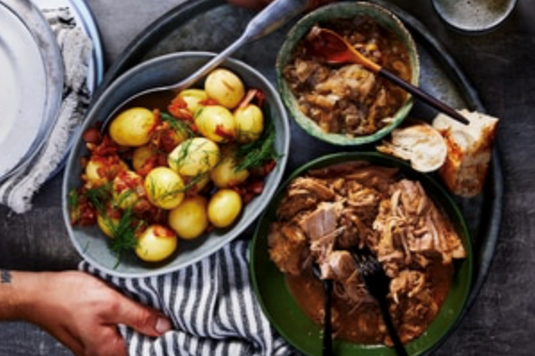 Pulled pork with braised cabbage and herb and bacon potatoes [Marcus Papadopoulo]