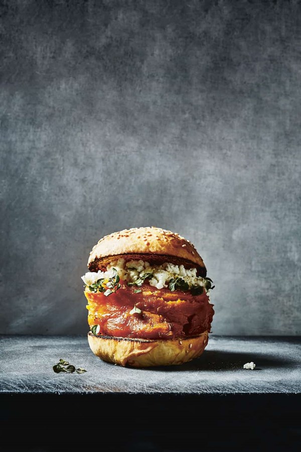 Pulled sweet potato burger with feta cheese, marjoram and black vinegar mix