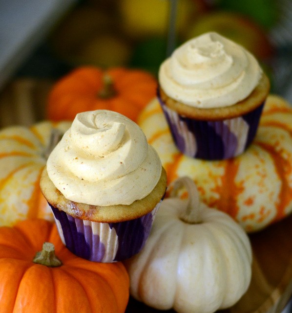 Pumpkin butter-swirled cupcakes with pumpkin buttercream