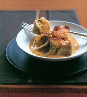 Pumpkin cappelletti with pumpkin crisps and curried carrot cream