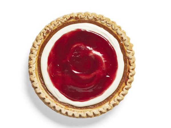 Pumpkin-cheesecake pie with cranberry glaze