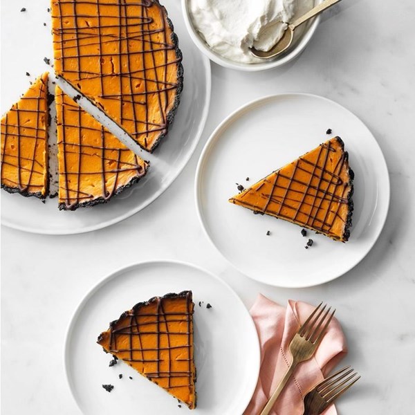 Pumpkin chocolate tart with cinnamon whipped cream