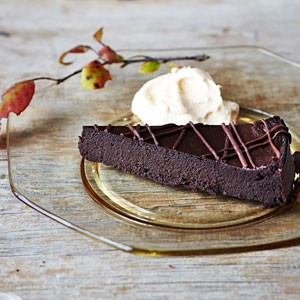 Pumpkin-chocolate torte with pumpkin whipped cream
