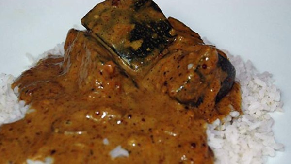 Pumpkin curry (Wattaka kalu pol)
