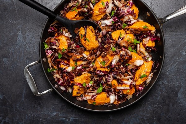 Pumpkin dumplings with bacon and radicchio