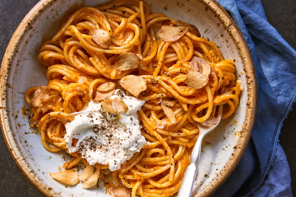 Pumpkin-gochujang pasta with crispy garlic chips