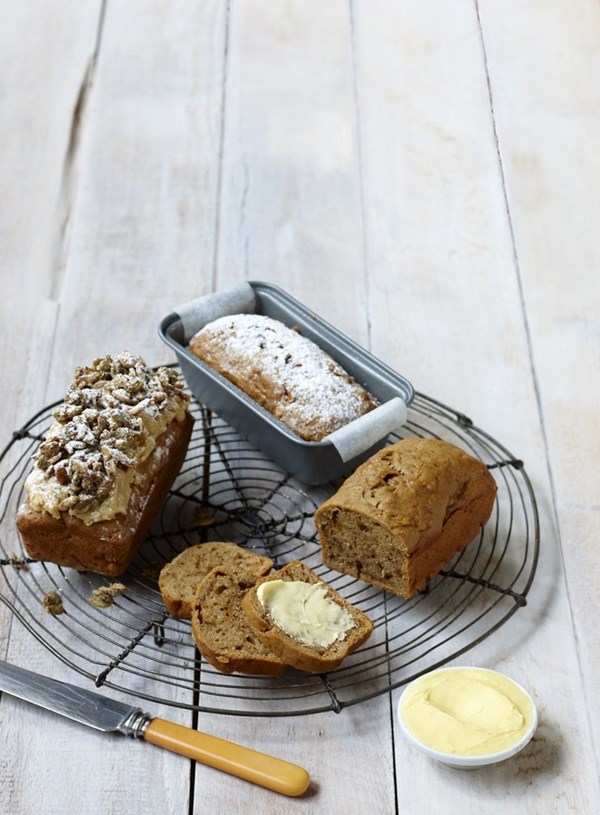 Pumpkin loaf with butterscotch icing and candied pumpkin seeds