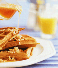 Pumpkin-orange waffles with hazelnut-maple syrup butter