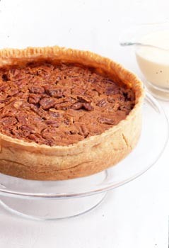 Pumpkin-pecan pie with whiskey butter sauce