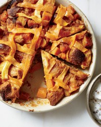 Pumpkin pie bread pudding with bourbon-pecan hard sauce