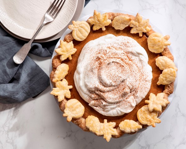 Pumpkin pie with whipped cream
