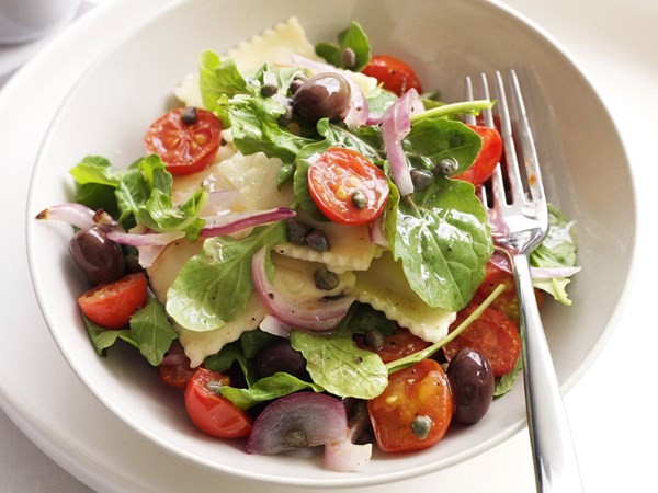 Pumpkin ravioli and roasted tomato salad
