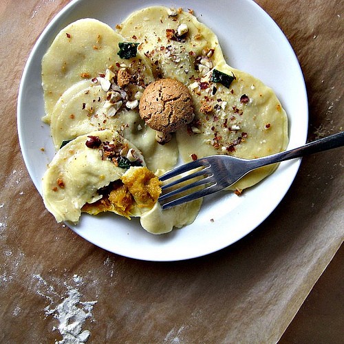 Pumpkin ravioli with sage and toasted hazelnuts