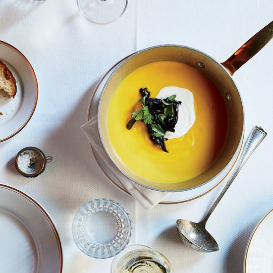 Pumpkin soup with trumpet mushrooms and sour cream