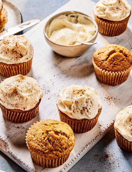 Pumpkin spice muffins with cream cheese frosting
