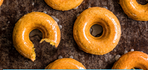 Pumpkin spiced doughnuts with salted maple glaze