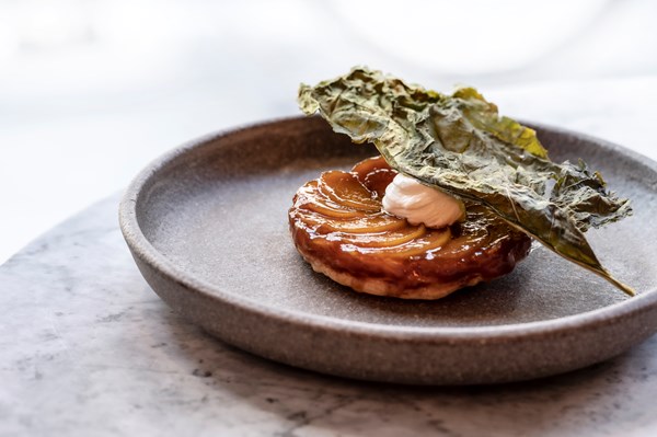Pumpkin tarte Tatin with whipped feta, fig leaf and cime di rapa