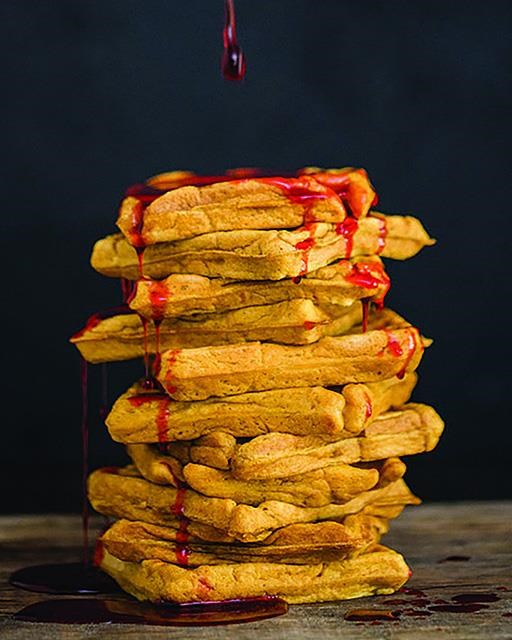 Pumpkin waffles with cranberry syrup