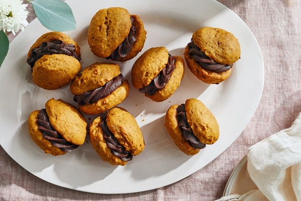 Pumpkin whoopie pies with chocolate cream cheese filling