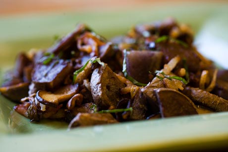 Purple potatoes with caramelized onions and shiitake mushrooms