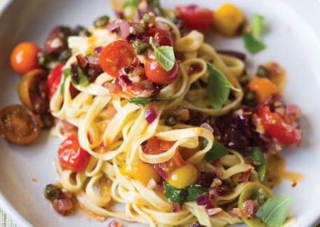 Puttanesca sauce with fried capers over linguine