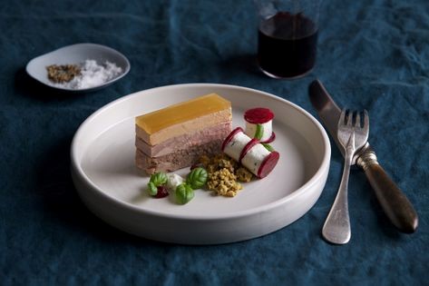 Quail, confit duck and foie gras terrine with pistachio soil, ruby beets and goat’s cheese