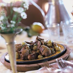 Quail with grapes and sausage (Quaglie con uva e salsiccia)