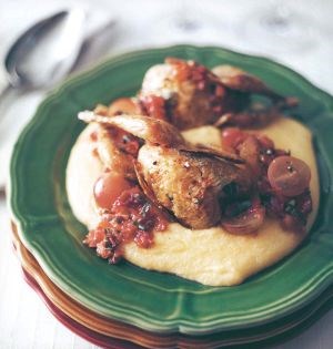 Quail with sage and grapes on a bed of polenta (Quaglie con salvia e uva)