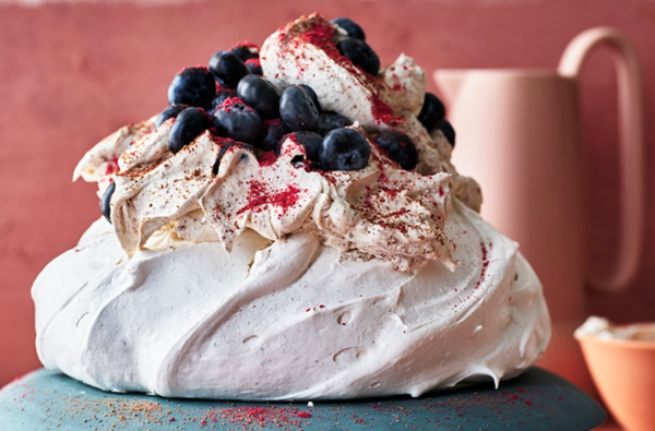Quandong and strawberry gum Pavlova with chocolate wattleseed cream